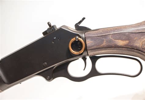 A 20" octagonal barrel adds weight out front to steady your aim; and a fully adjustable buckhorn-style rear sight and a brass bead front sight allow precise shot placement on small targets. . Henry lever action rifle accessories